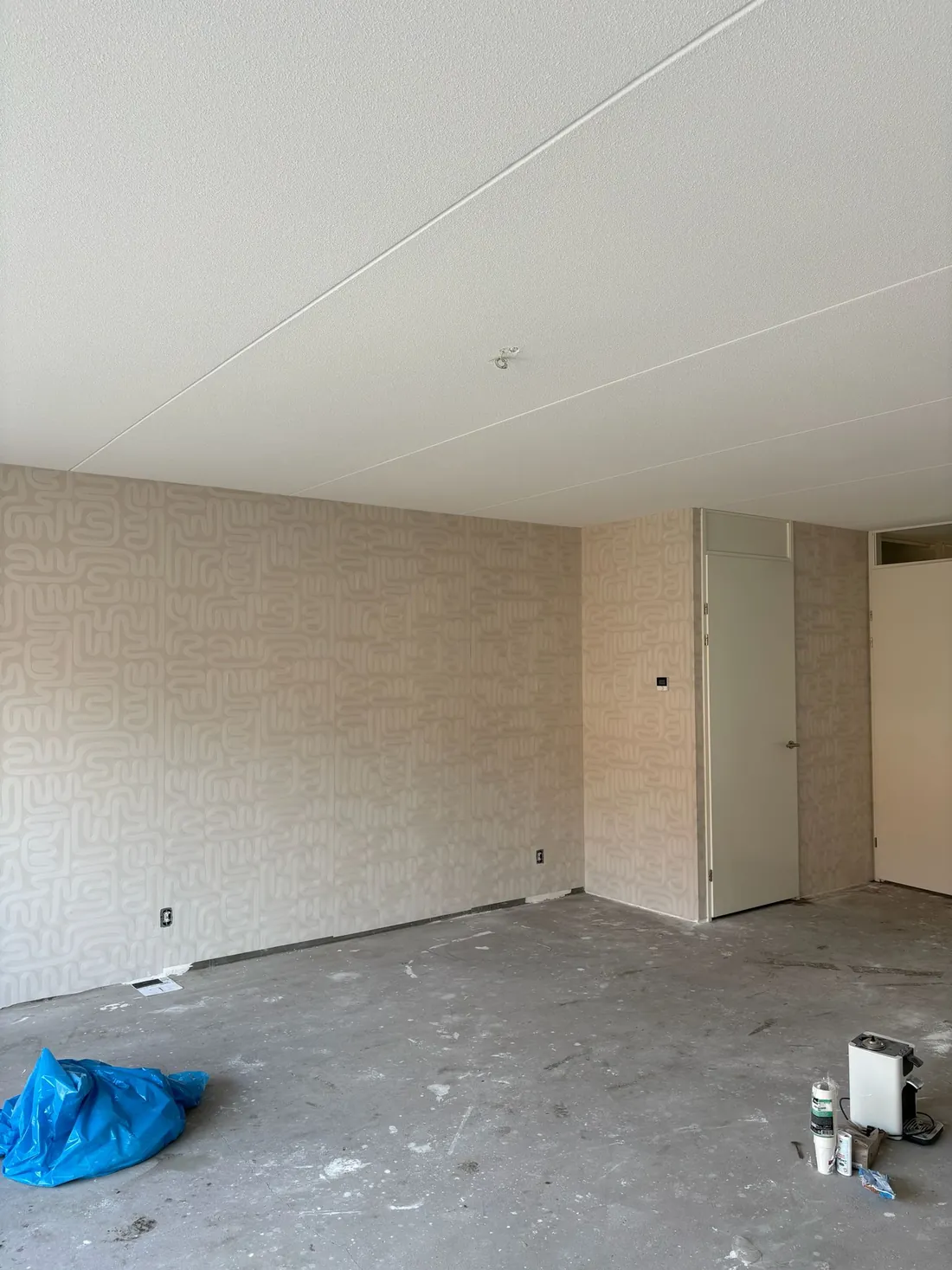 Woonkamer met Arte behang